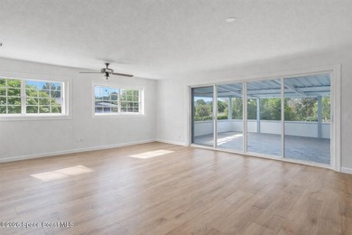 Waterfront Living with Endless Potential! Situated on navigable - photo 4