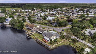 Waterfront Living with Endless Potential! Situated on navigable - photo 6