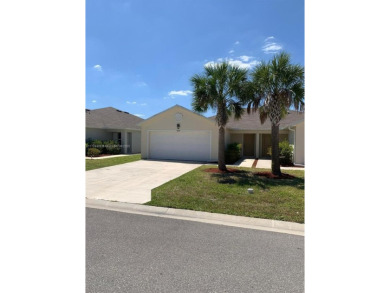 Lake Home For Sale in Lehigh Acres, Florida