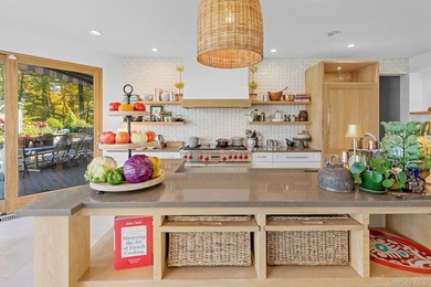 A rare offering where tranquil water views meet timeless natural - photo 8
