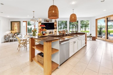A rare offering where tranquil water views meet timeless natural - photo 9