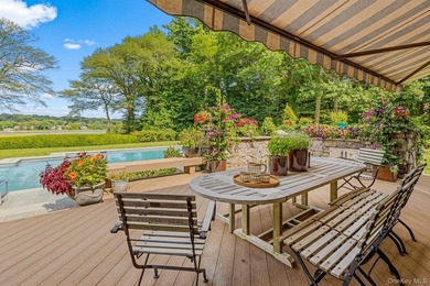 A rare offering where tranquil water views meet timeless natural - photo 10