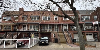 This duplex-style home features seven bedrooms, three full baths - photo 2
