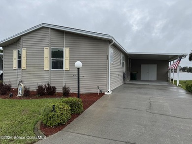 Rarely available lakefront property! This 2-bedroom, 2-bath home - photo 1