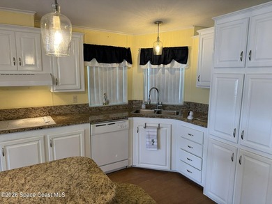 Rarely available lakefront property! This 2-bedroom, 2-bath home - photo 6