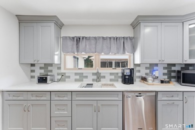 This one will amaze you! Kitchen has been totally remodeled with - photo 11