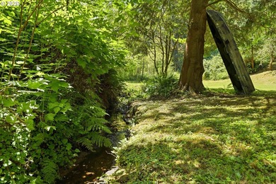 Tucked away at the end of a private driveway, this secluded and - photo 5