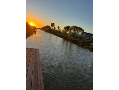 Canal-front turnkey coastal retreat with private fishing dock - photo 3