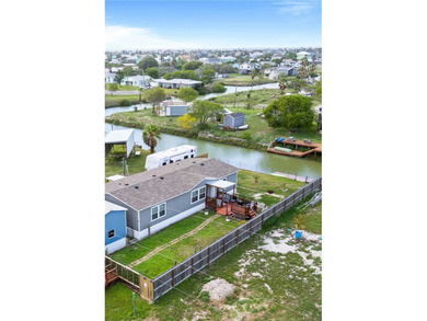 Canal-front turnkey coastal retreat with private fishing dock - photo 6