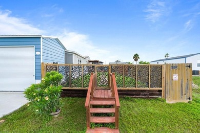 Canal-front turnkey coastal retreat with private fishing dock - photo 7