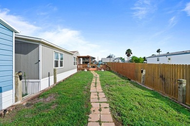 Canal-front turnkey coastal retreat with private fishing dock - photo 8