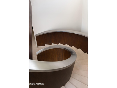 A fabulous hillside contemporary located in Tatum Canyon. This 5