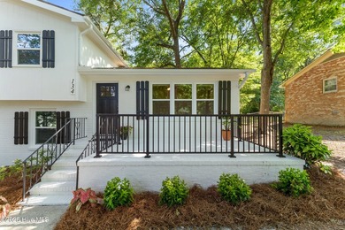 Nestled beneath a beautiful canopy of mature trees in a - photo 8