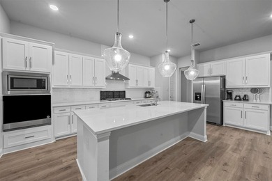 Welcome to almost new 2024 built modern home. The foyer opens - photo 6
