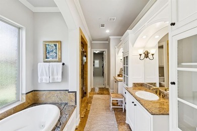 This exquisite home in the highly sought after Twin Creeks