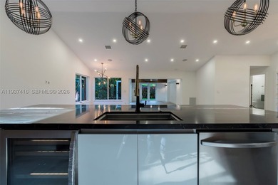 Nestled on a serene, private corner lot within the prestigious - photo 20