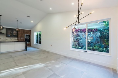 Nestled on a serene, private corner lot within the prestigious - photo 28