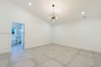Nestled on a serene, private corner lot within the prestigious - photo 33