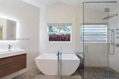 Nestled on a serene, private corner lot within the prestigious - photo 39