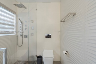 Nestled on a serene, private corner lot within the prestigious - photo 42