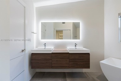 Nestled on a serene, private corner lot within the prestigious - photo 45
