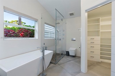 Nestled on a serene, private corner lot within the prestigious - photo 46