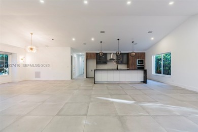 Nestled on a serene, private corner lot within the prestigious - photo 48