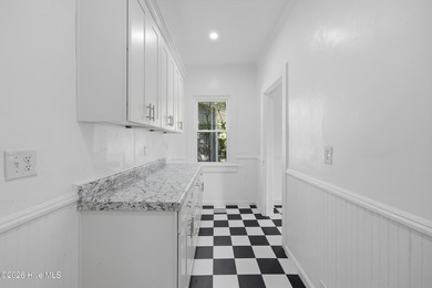 This beautiful 1920 era home has been brought back to life in a - photo 14