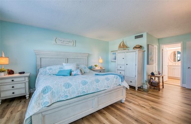 Experience refined WATERFRONT LIVING with sweeping views of the - photo 10