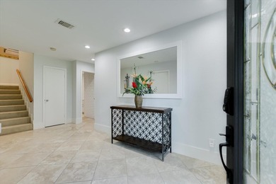 Experience luxurious lakefront living in this stunning 4 bed, 4 - photo 3