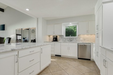Experience luxurious lakefront living in this stunning 4 bed, 4 - photo 8
