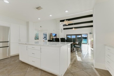 Experience luxurious lakefront living in this stunning 4 bed, 4 - photo 9