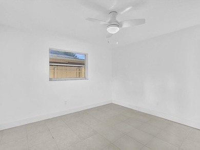 This 3-bedroom, 2-bathroom house is located in a quiet corner of - photo 22