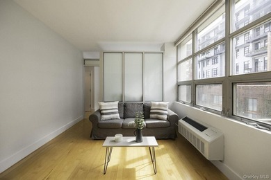 Welcome to refined loft living at 5-26 47th Road in the heart of - photo 3