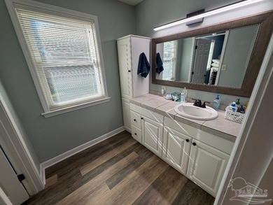 This well-kept 4-bedroom, 2-bath home, has a warm cottage - photo 44
