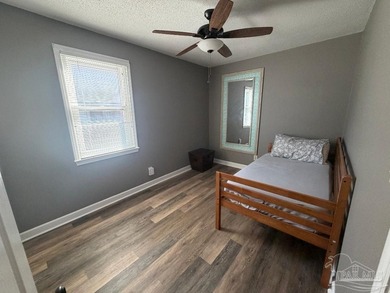 This well-kept 4-bedroom, 2-bath home, has a warm cottage - photo 45