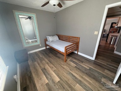 This well-kept 4-bedroom, 2-bath home, has a warm cottage - photo 46