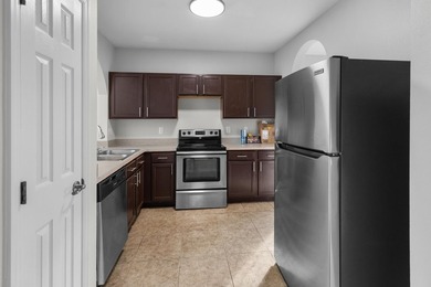 This charming 3 bedroom, 2 1/2 bathroom residence offers high - photo 12