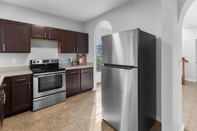 This charming 3 bedroom, 2 1/2 bathroom residence offers high - photo 13
