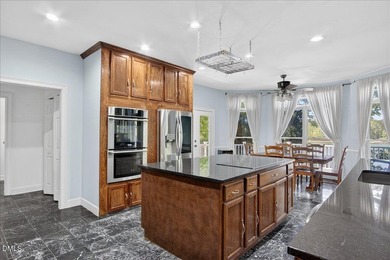 Experience expansive views of Kerr Lake from this impressive - photo 15