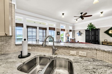 Welcome Home to your exquisite lakefront coastal oasis! Wild - photo 12