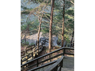 This waterfront secluded getaway is boasting with 3BR and 2BA - photo 12
