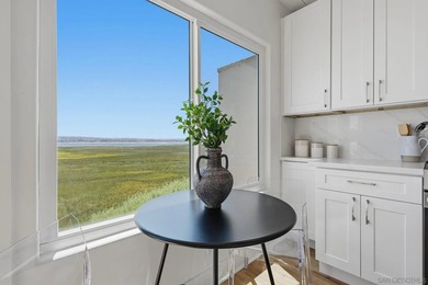 Wake each morning to the gentle shimmer of Mission Bay, where - photo 12