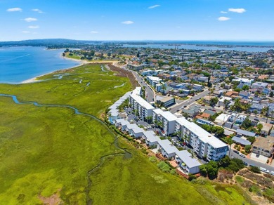 Wake each morning to the gentle shimmer of Mission Bay, where - photo 23