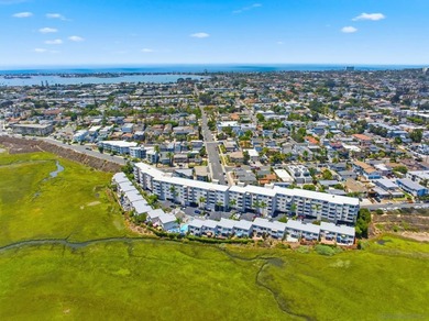 Wake each morning to the gentle shimmer of Mission Bay, where - photo 25