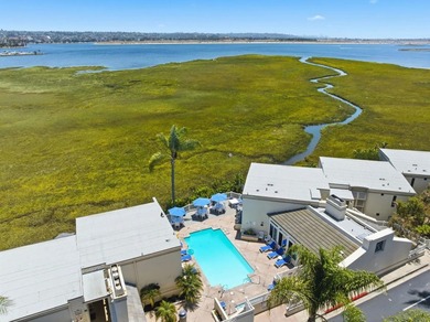 Wake each morning to the gentle shimmer of Mission Bay, where - photo 29