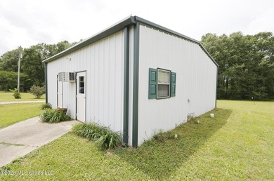 Nestled on five beautiful acres, this versatile property offers - photo 11