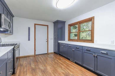 Nestled on two wooded lots just south of Waupaca, this 3BR, 2BA - photo 11