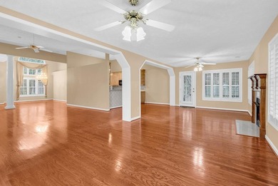 Nestled beneath mature oaks, this custom all-brick home offers a - photo 12