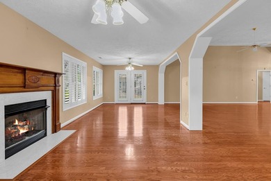 Nestled beneath mature oaks, this custom all-brick home offers a - photo 14